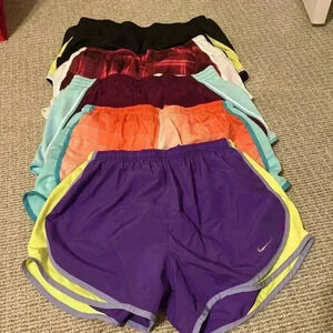 Five pairs Nike Dri fit shorts size medium.